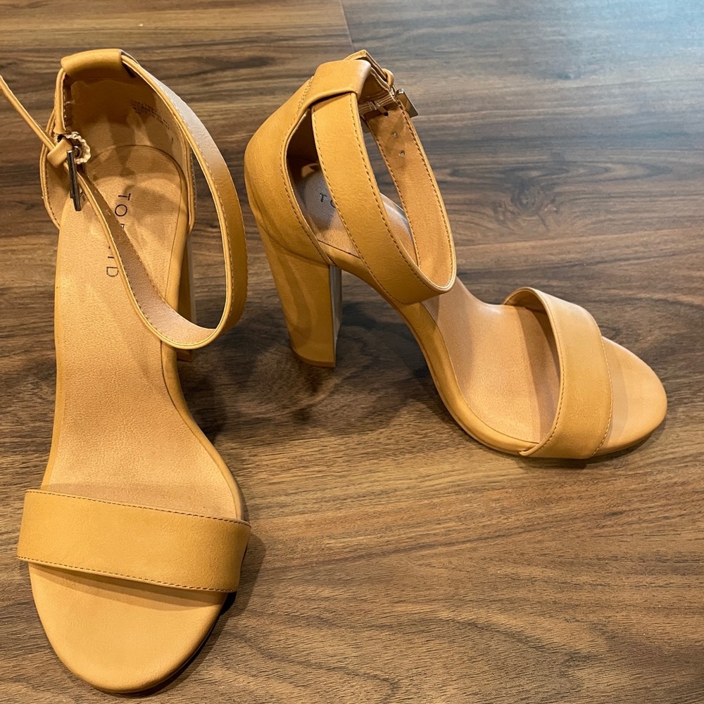 Torrid size 9W Ladies Tan two-strap tapered chunk heel. 4 in. heel. Gently used.